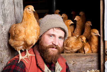 Portrait of Farmer with Chicken on Shoulder