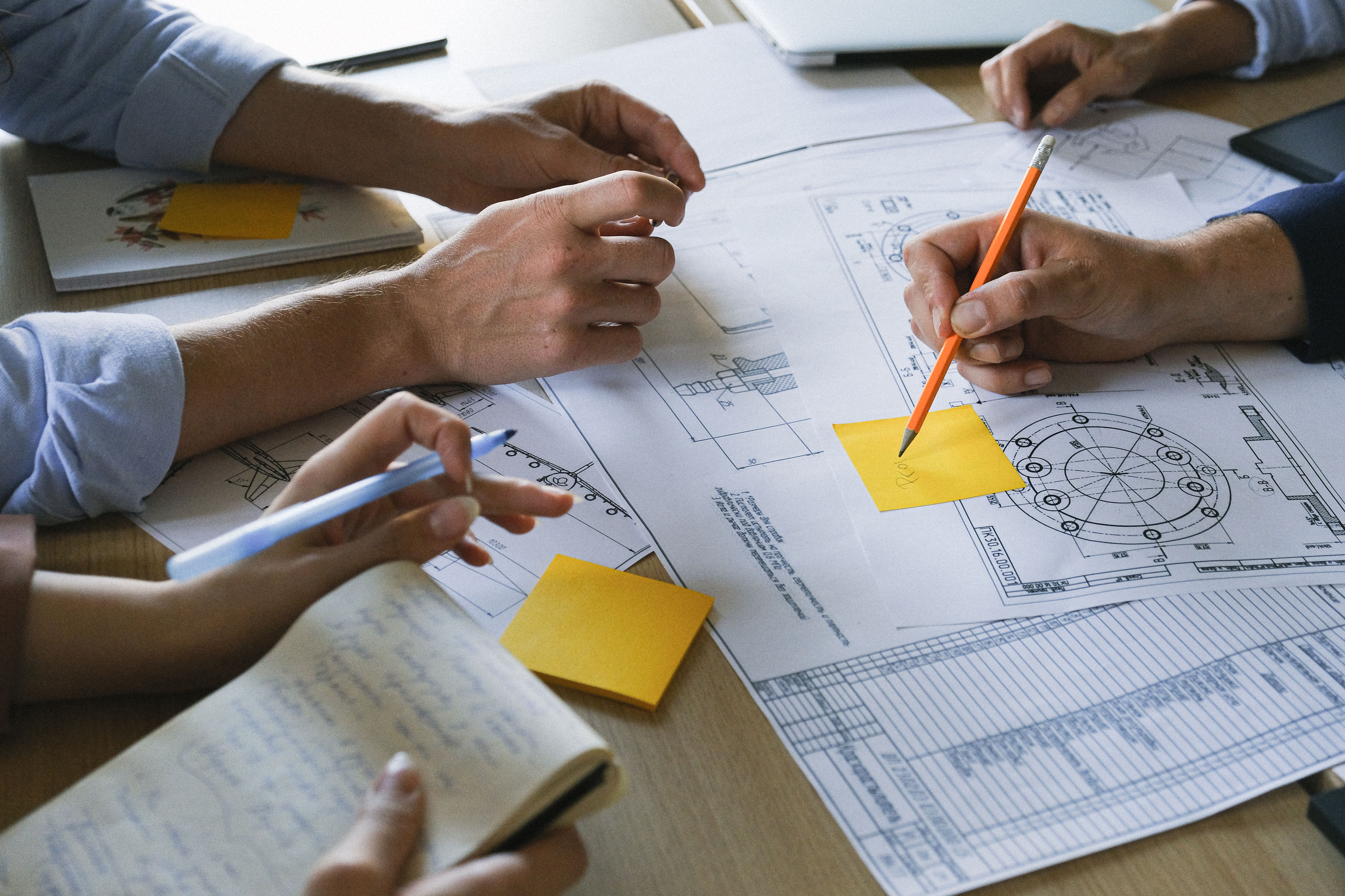 Engineering team coordinating site plans
