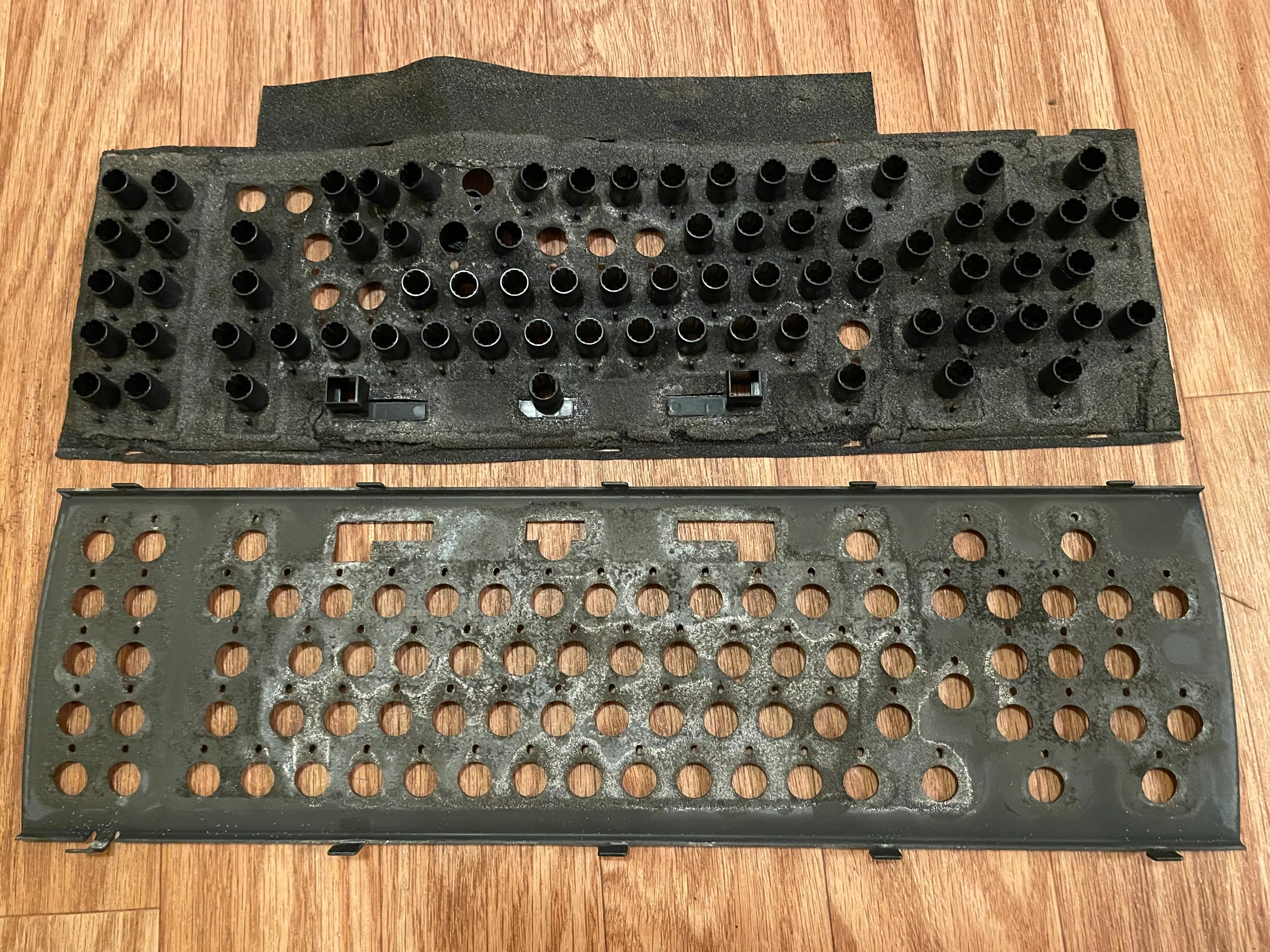 a heavily corroded keyplate and the barrel foam is corroded and rotting