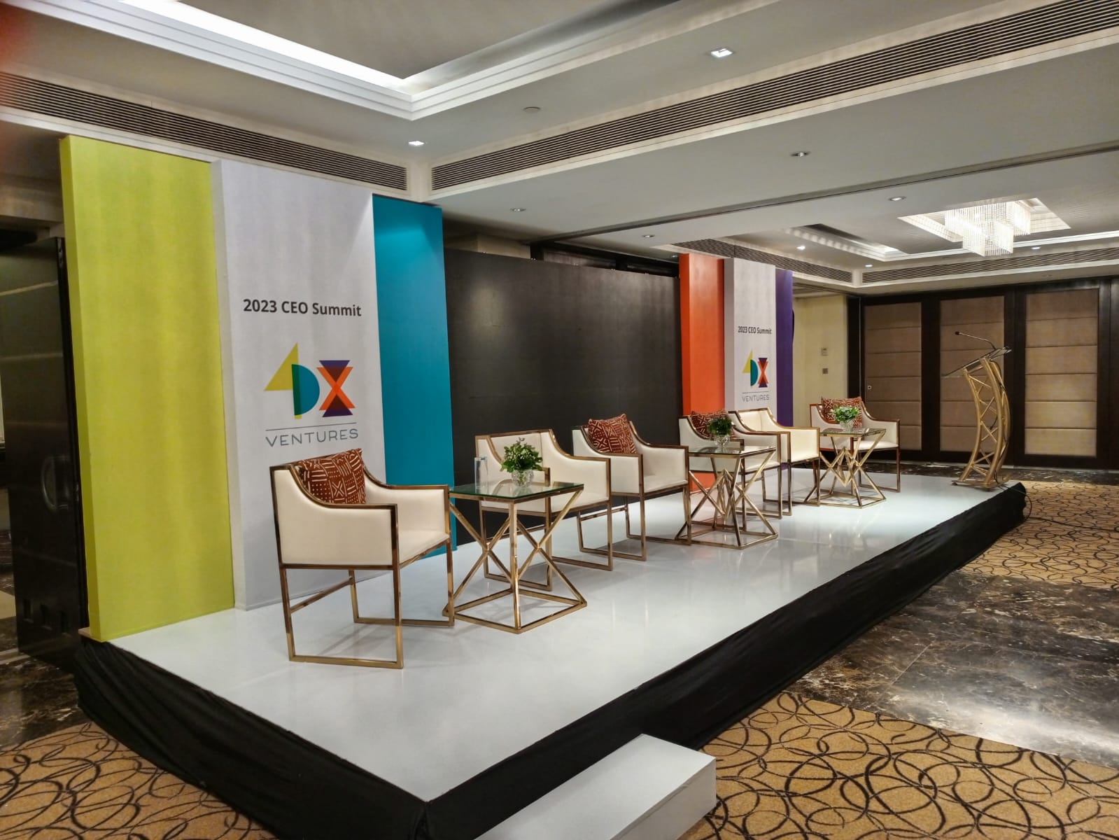 Branded conference set pieces reading A New World of Possibilities
