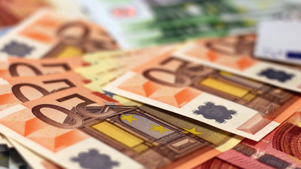 Stack of 50 euro banknotes, representing wealth and finance concepts.
