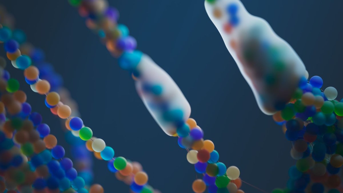 Close-up of a colorful abstract representation of DNA strands, illustrating science and genetics.