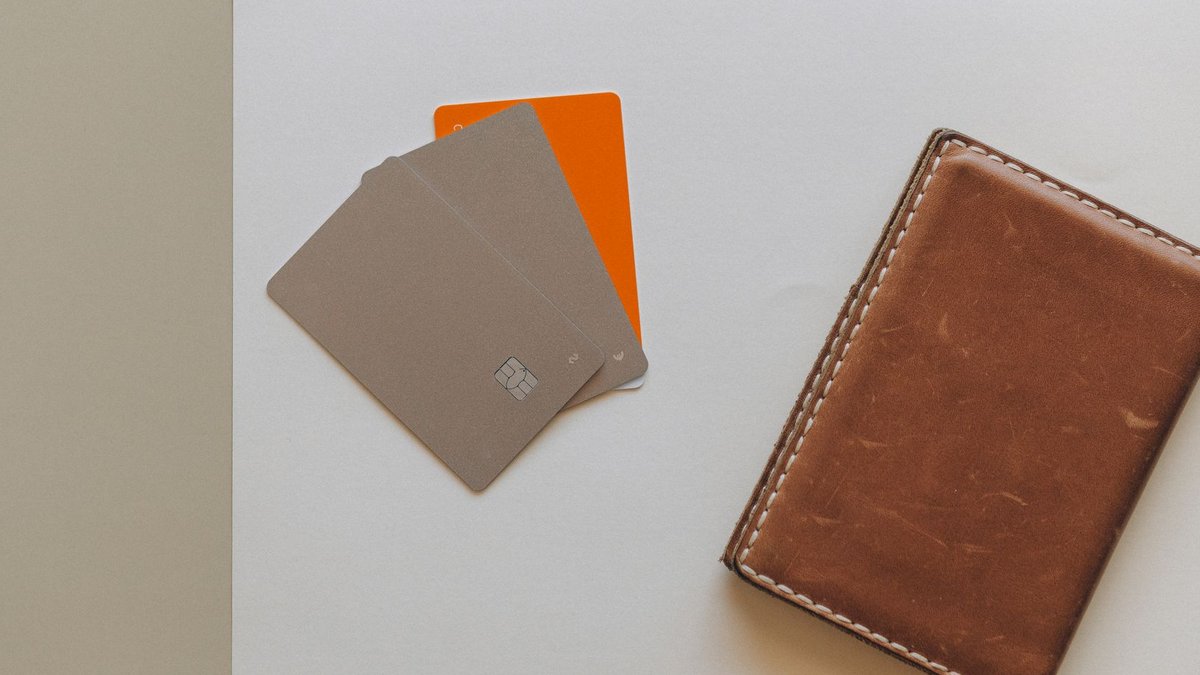 BlackRock brings transparency to $2 trillion private credit boom A leather wallet and credit cards on a minimalist background, ideal for financial themes.
