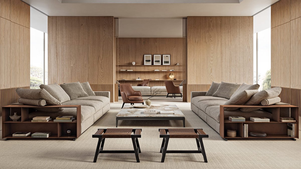 Spacious modern living room with two beige Flexform Groundpiece sofas, a central coffee table, wooden wall panels, built-in s