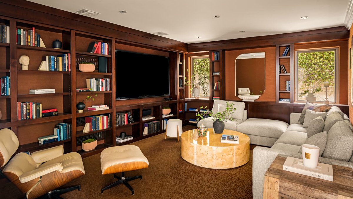 Dolly Parton's Hollywood Hills Home Lists at $7.95M There’s a library and media room. Paul Barnaby Photography.