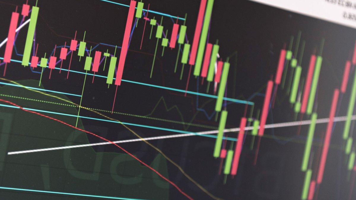 UBA, Access shares lag as investors await H1 results Close-up of vibrant stock market graphs displaying trading trends on a monitor, ideal for finance and cryptocurrency concepts