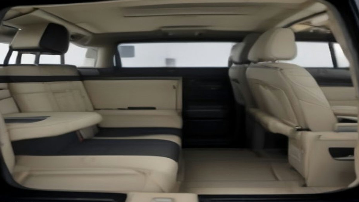 Cadillac Escalade with open power doors.