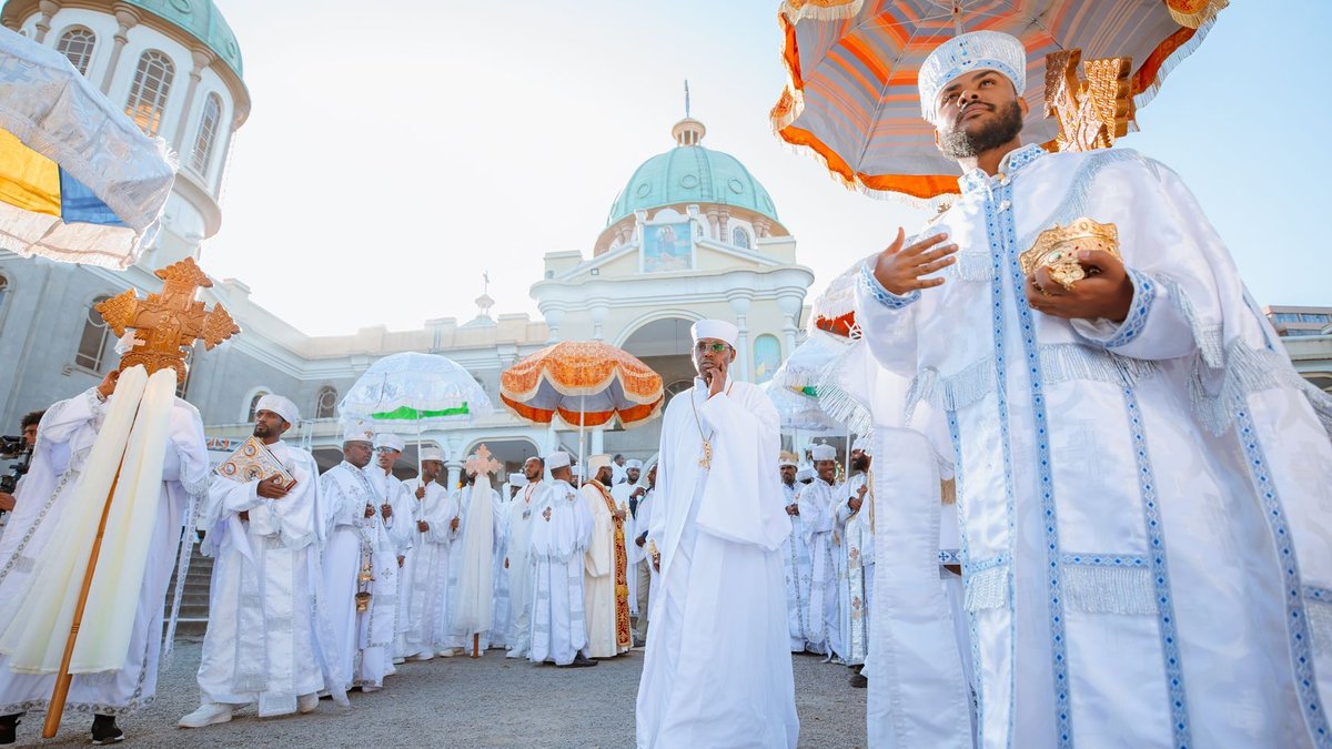 Ethiopia joins Pan-African payment system network Orthodox religious procession at a church in Addis Ababa, Ethiopia, showcasing traditional attire and rituals.