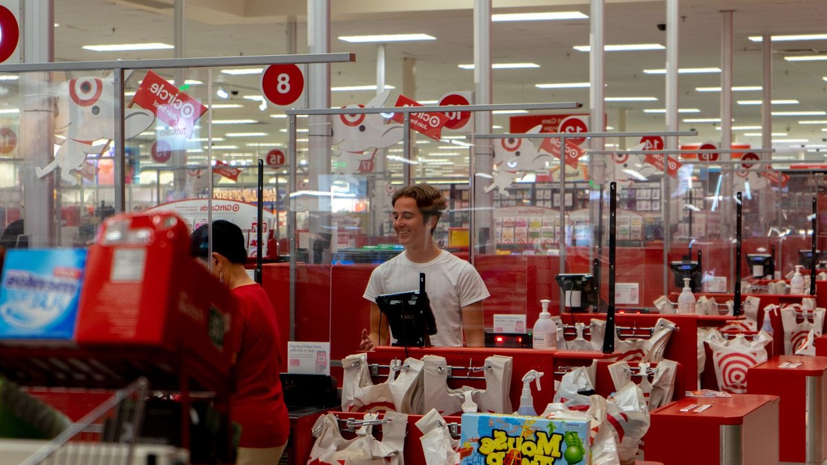 A bustling checkout area in a retail store, capturing the essence of modern shopping.