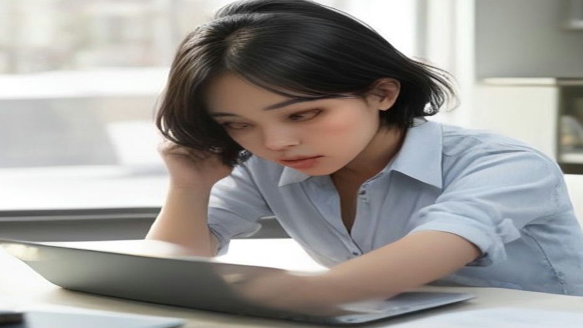Person filing taxes on laptop.