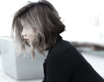 girl sitting side view
