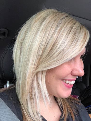 side view of girl with blonde hair