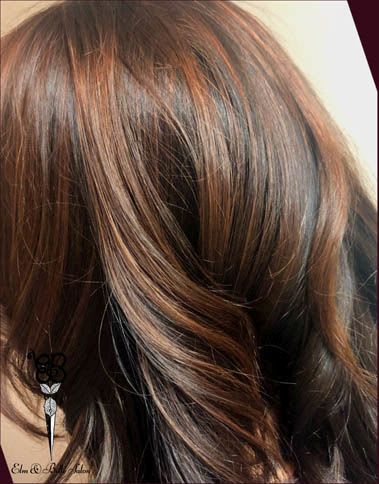back view of girl with red brown hair color