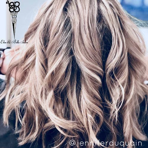 back view of girl with wavy blonde hair