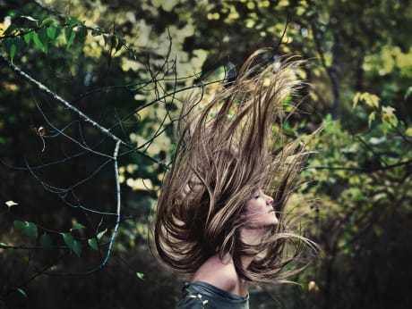 girl with long gold color hairstyle flowing