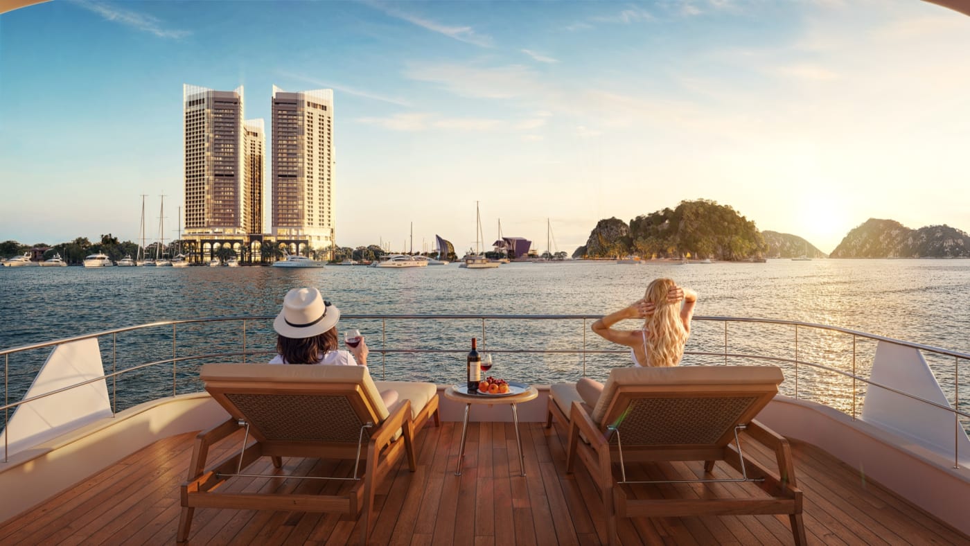 Croisière sur la baie de Bai Tu Long avec les tours du Centara Van Don en arrière-plan