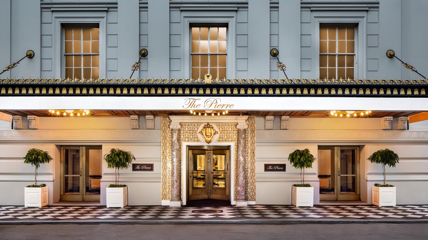 The entrance of The Pierre hotel under its canopy on 61st Street in New York