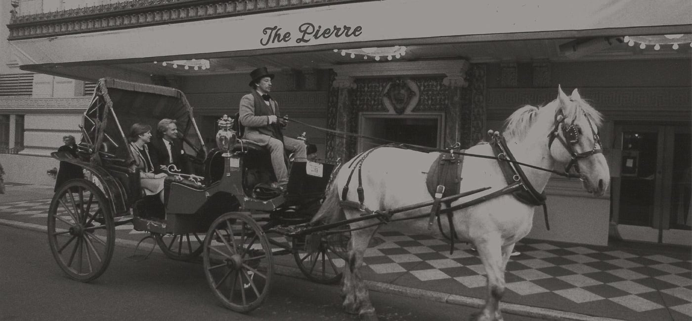 Archive photo of a horse-drawn carriage outside The Pierre hotel