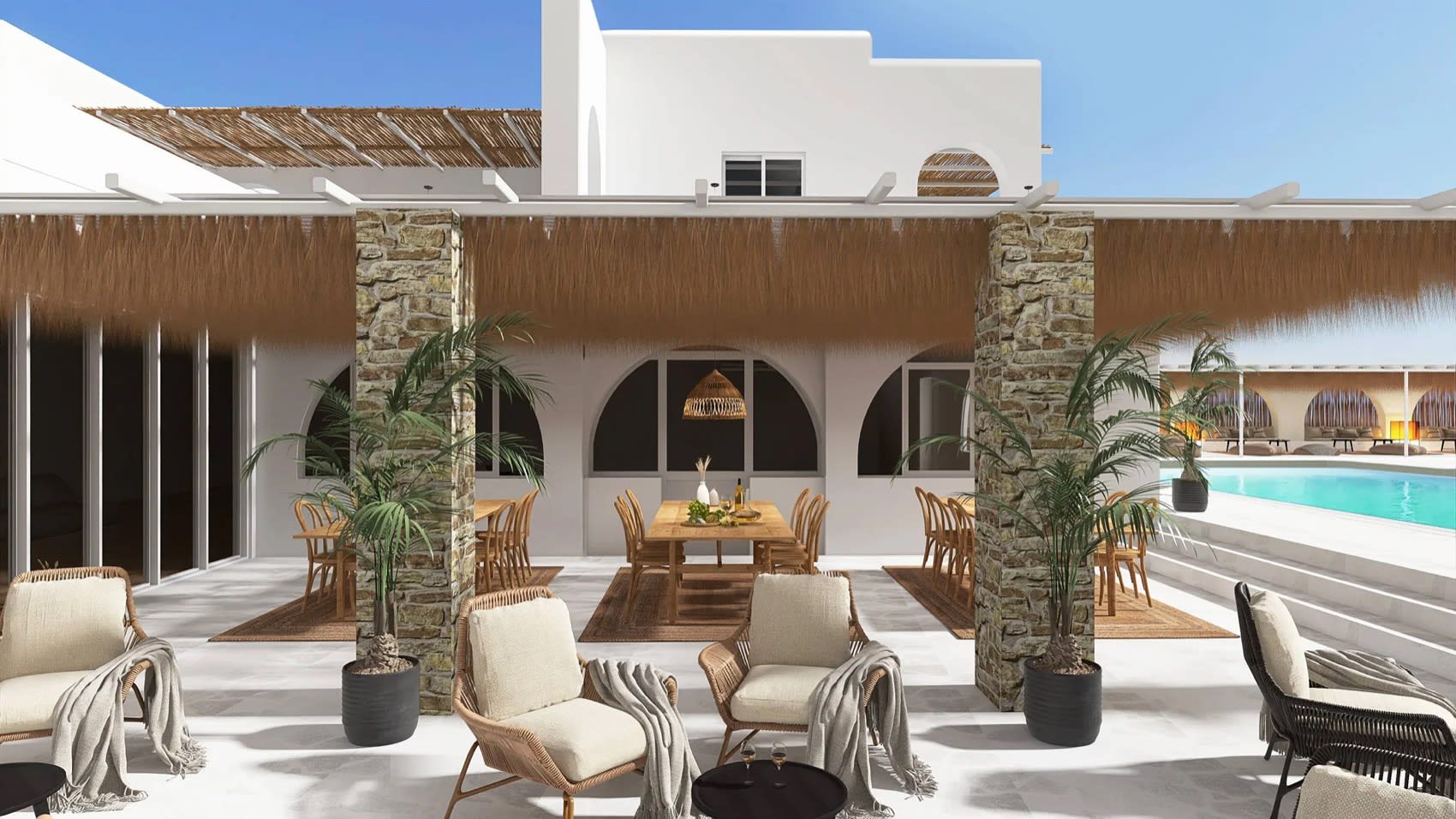 La piscine et les terrasses du Radisson Individuals Pounda Resort Paros face à la mer Egee