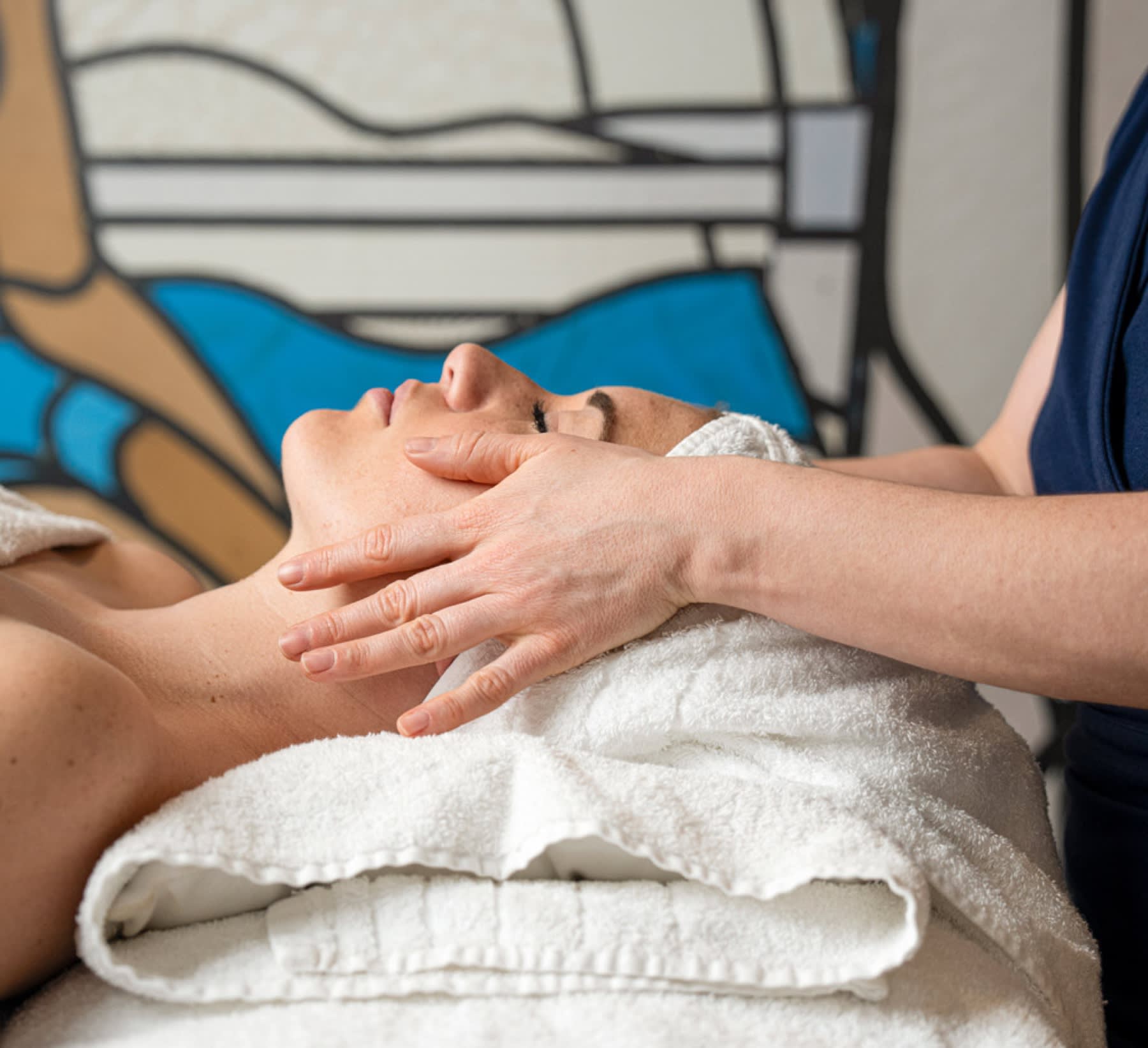 Spa treatment at Molitor Paris, behind an Art Deco stained glass window
