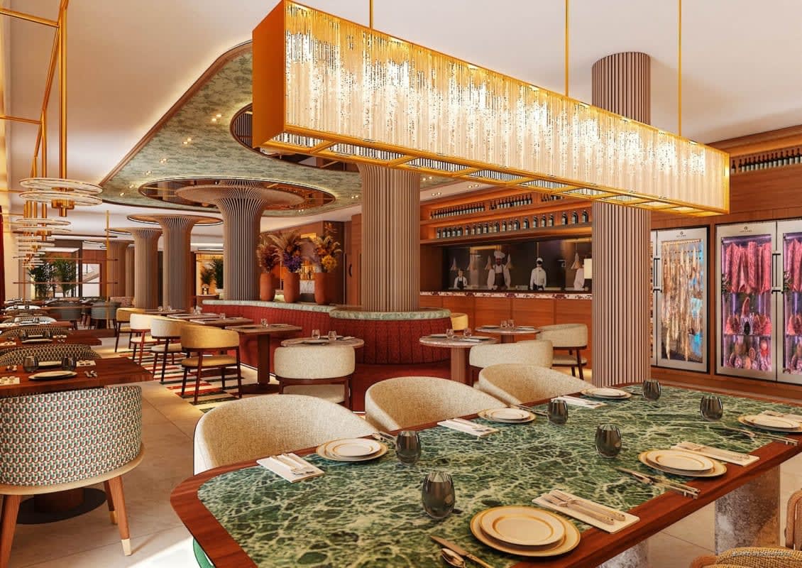 El restaurante y su barra de mármol verde