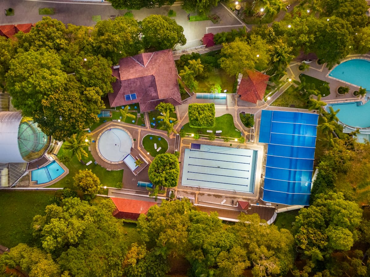 bird's - eye view of an aerial view of a swimming pool and