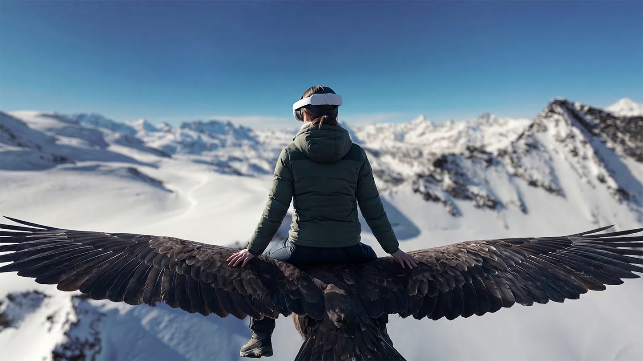 A guest wearing a VR headset, shown seated on the back of an alpine chough flying over the snow-covered Valais Alps