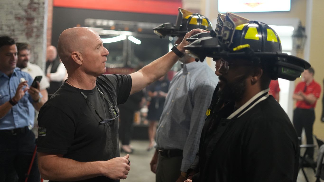Qwake Technologies CEO Sam Cossman presenting the C-THRU helmet at Carmel Fire Department demonstration