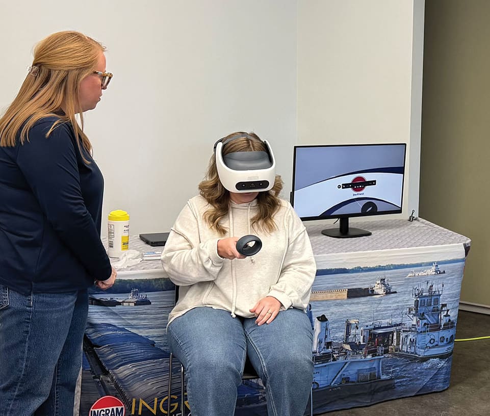 Women from the Western Kentucky chapter of Women in Maritime Operations view VR technology firsthand at Ingram Barge in Paducah