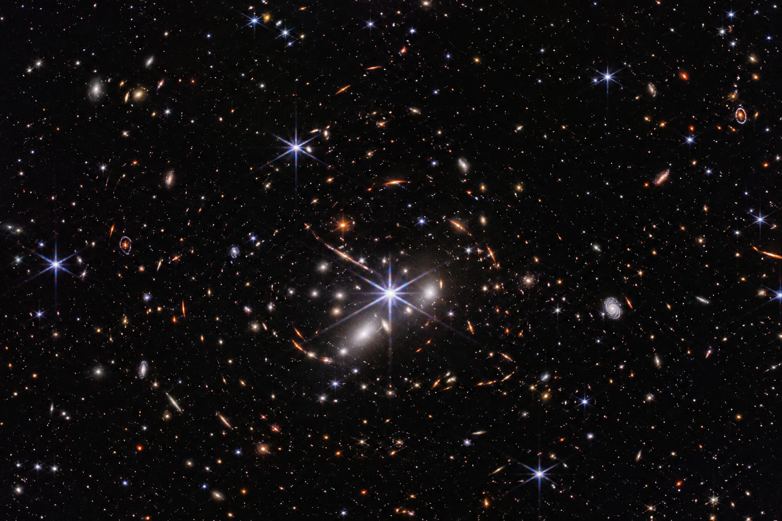 Artist rendering of bright ancient galaxies discovered by James Webb Space Telescope in deep space