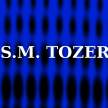 S.M.  TOZER