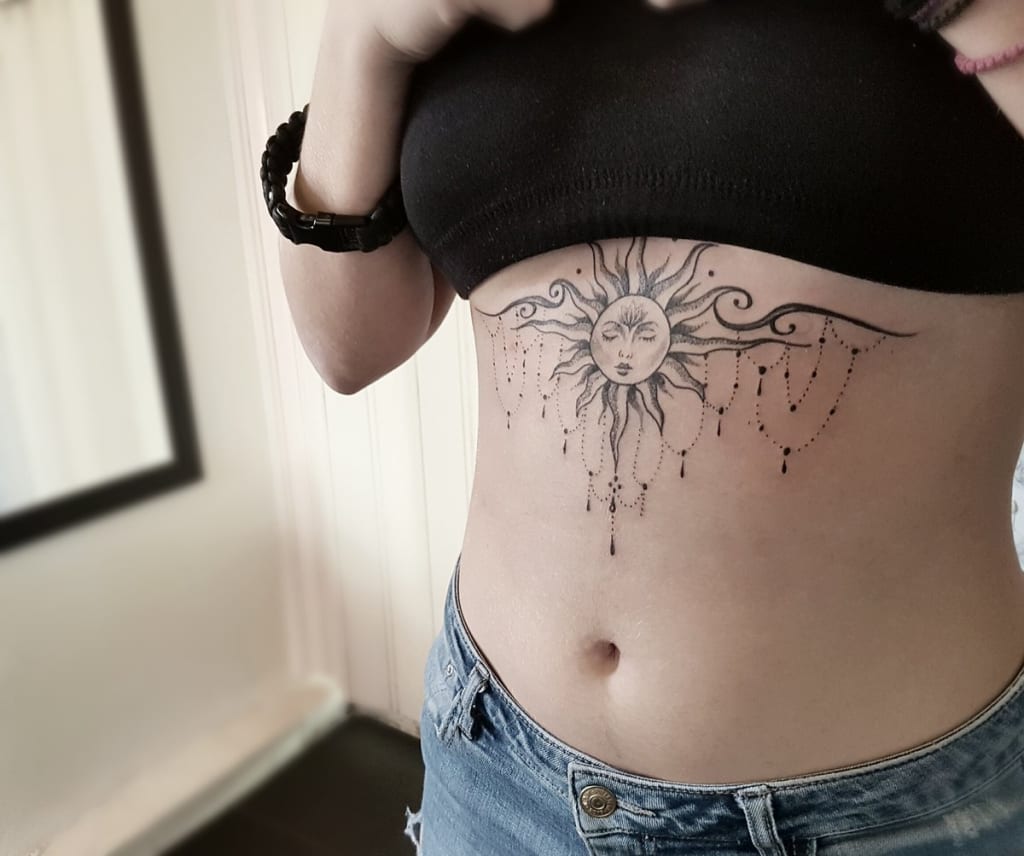 15 Attractive Sternum Tattoo Designs and Ideas 2023