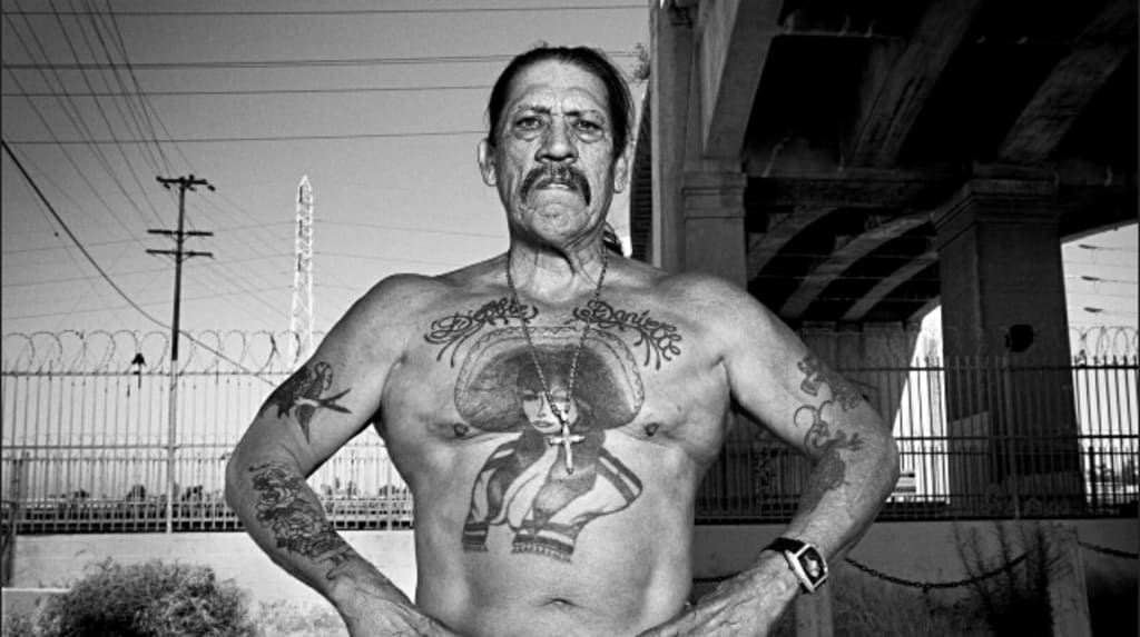 Download Danny Trejo Exposing His Body Tattoos Wallpaper  Wallpaperscom