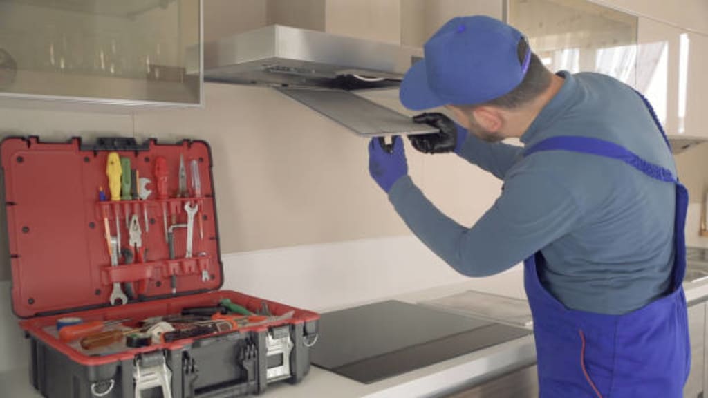 How to install a range hood vent through a window Journal