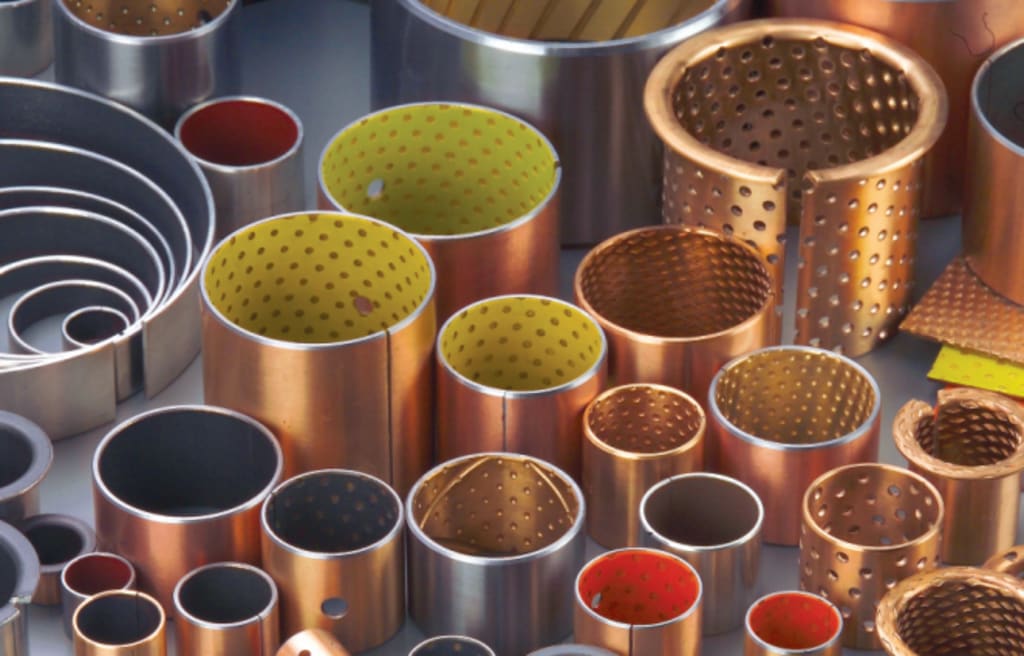 The Evolution of Mulcher Bearings Solid Wrapped Bronze Bushing vs Self