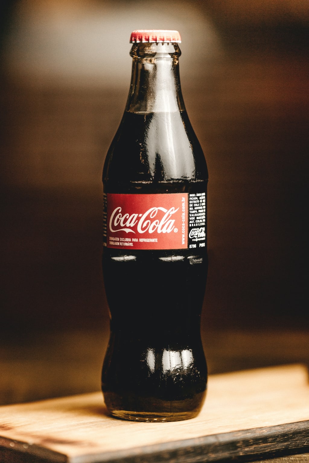 The Story Behind Coca-Cola's Iconic Coke Bottle