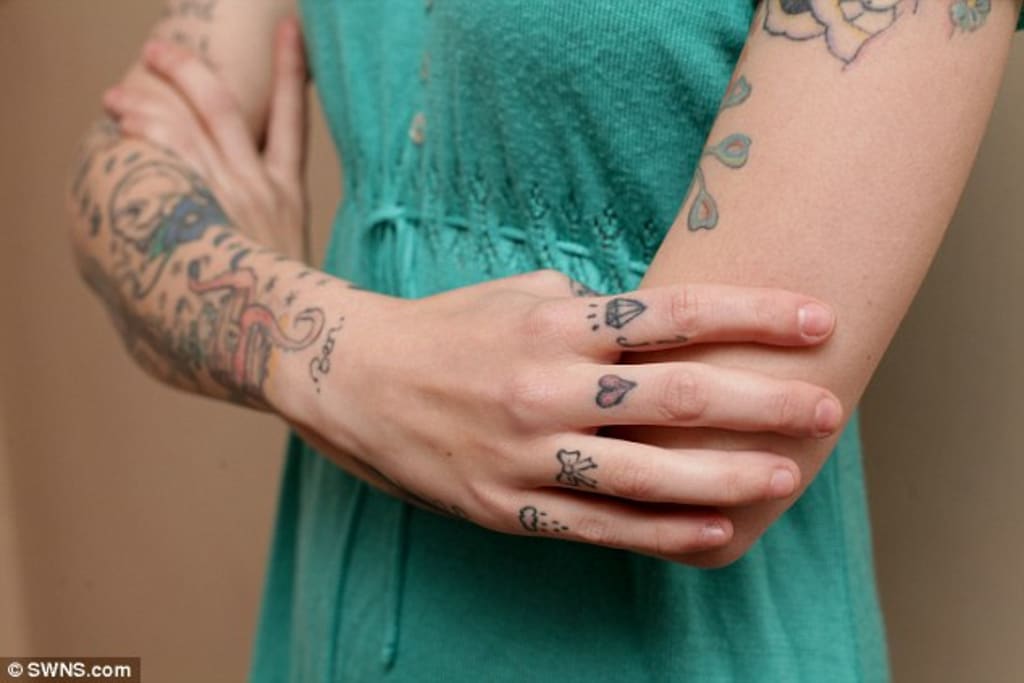 School teacher in France says hes barred from teaching kindergarten  because of tattoos  National  wdrbcom