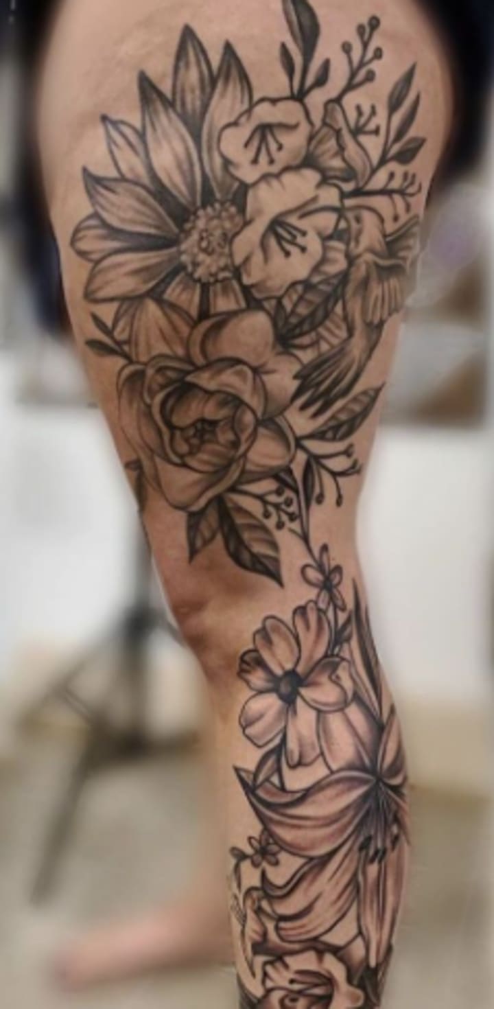 Beautiful leg sleeve tattoo done by our artist professional
