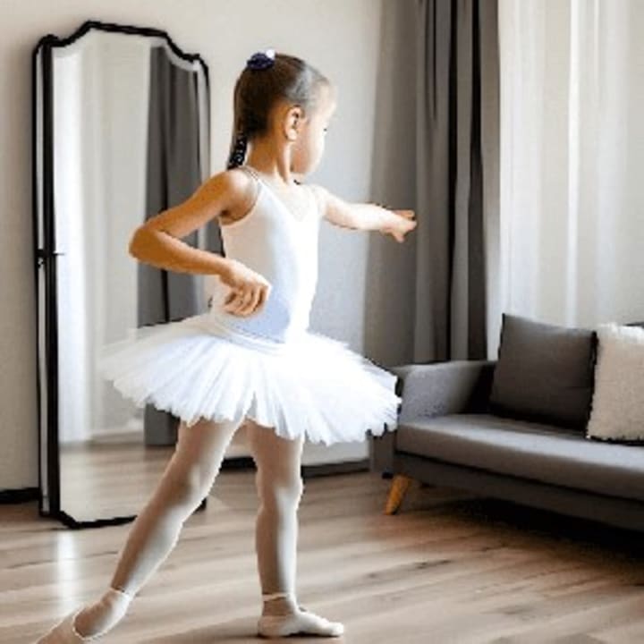 Boy and girl ballet dancers performing port de bras side stretches