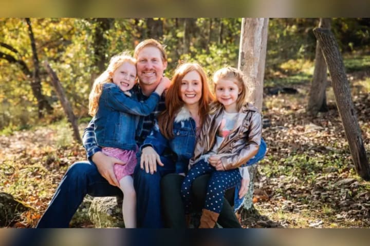 Philip with his wife and two children