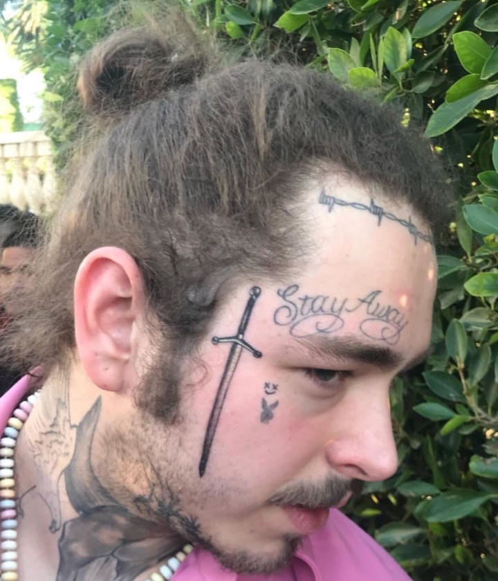 Post Malone Breaks Down His NeverEnding Collection of Tattoos  GQ