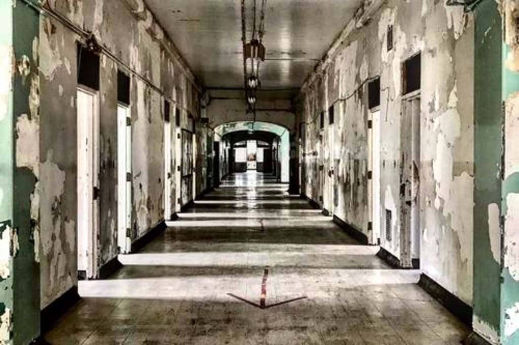 The Haunting History of The TransAllegheny Lunatic Asylum