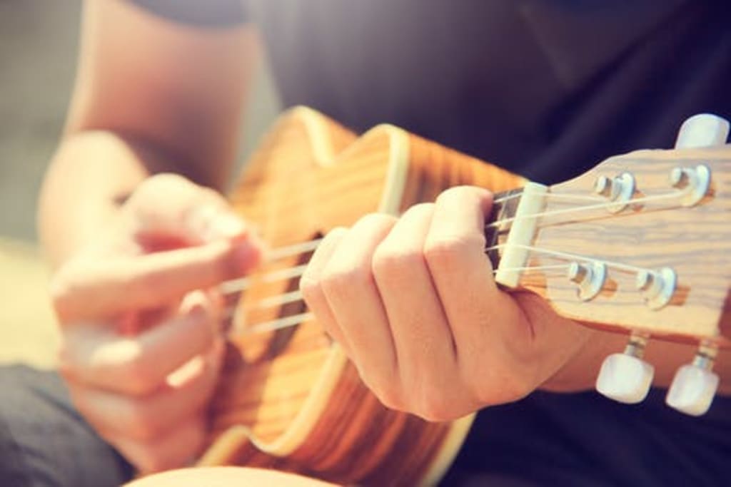 Why You Should Learn to Play the Ukulele... Why You Should Learn to Play the Ukulele...