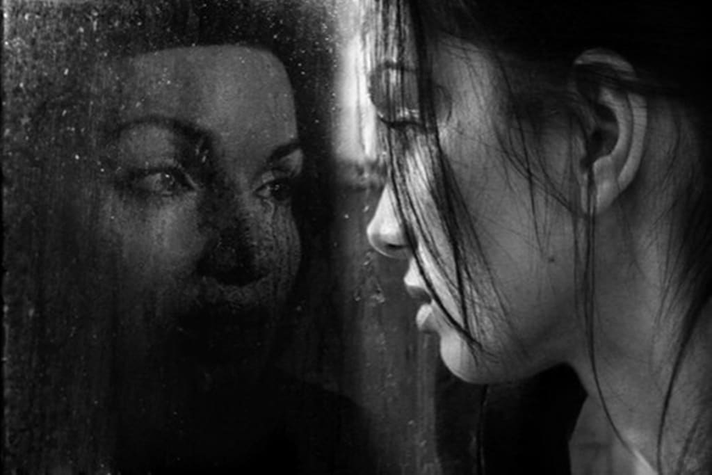 Two Sides of the Mirror Two Sides of the Mirror