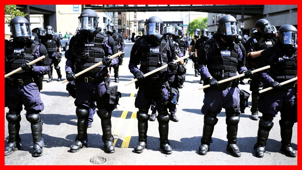 No Cops, No KKK! No Cops, No KKK!
