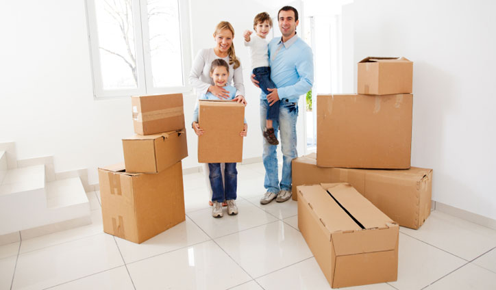 family with the packing boxes