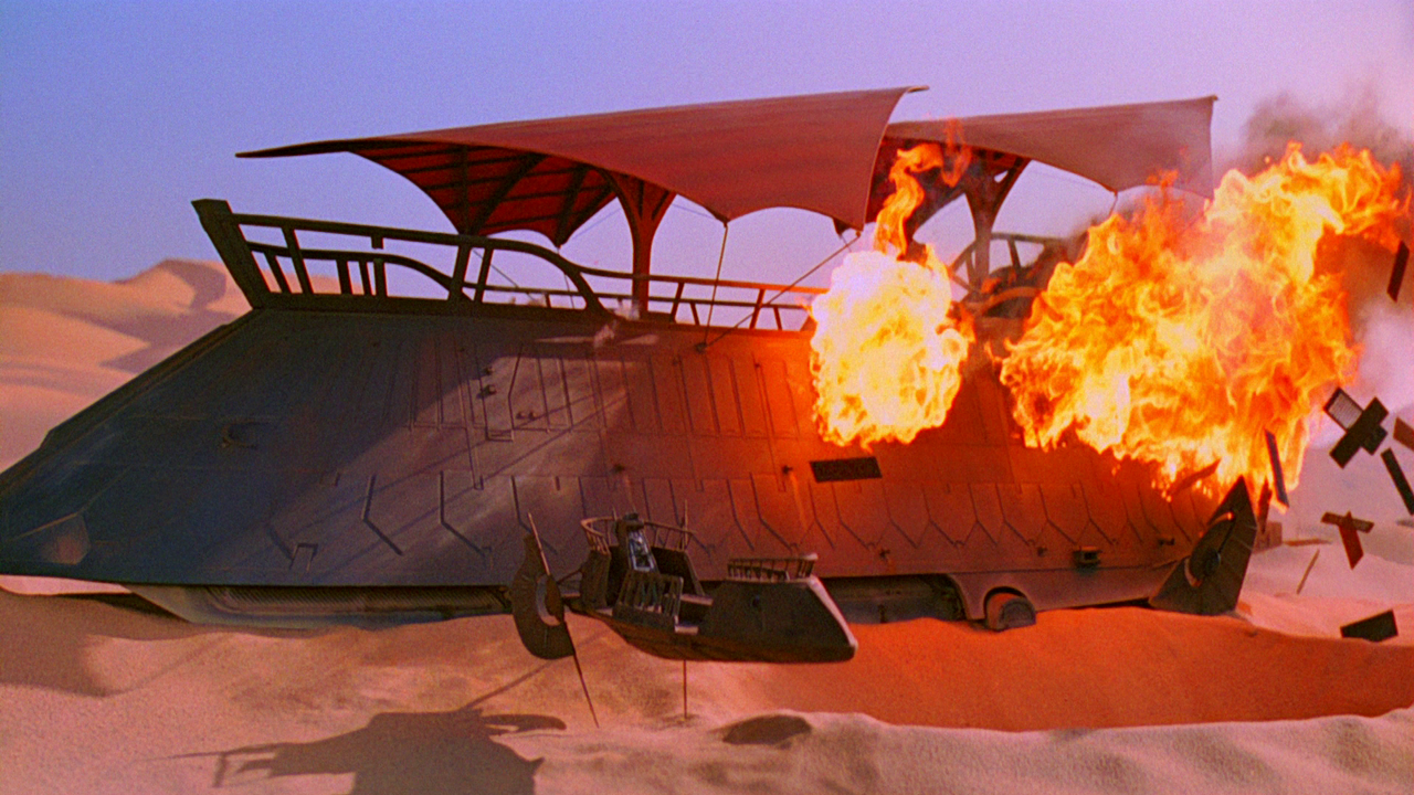 Jabba the Hutt's sail barge burns and explodes over the Dune Sea after Luke and Leia's escape in Return of the Jedi