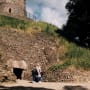 Three people at a dolmen