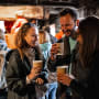 Three people drinking cider