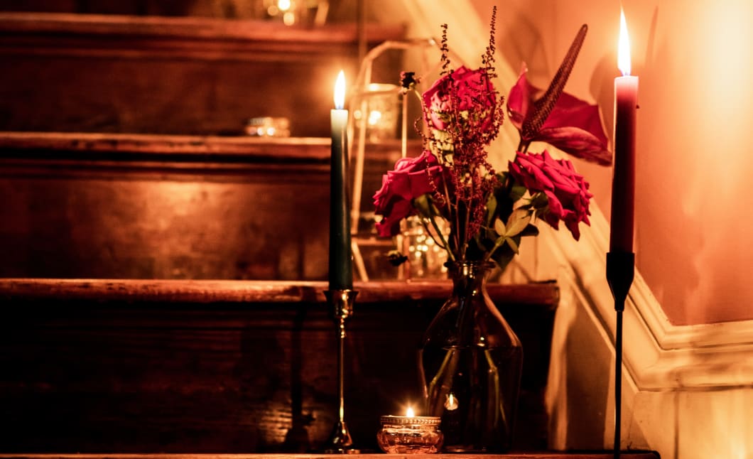 Victorian House Jersey Museum wooden stairs with candels and flowers